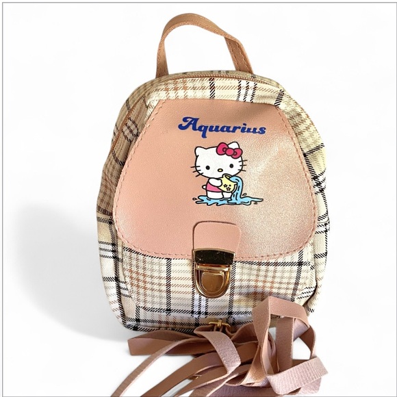 Hello Kitty 3/$30 plaid mini backpack Aquarius Design with removable straps NWOT - Picture 1 of 10